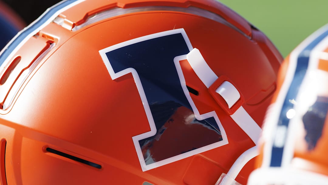Oct 1, 2022; Madison, Wisconsin, USA;  Illinois Fighting Illini logo on a helmet during warmups prior to the game against the Wisconsin Badgers at Camp Randall Stadium. Mandatory Credit: Jeff Hanisch-Imagn Images