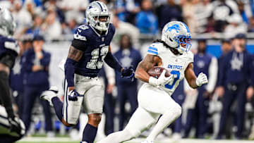 Detroit Lions running back Jahmyr Gibbs (0) runs against Dallas Cowboys during the first half at Ford Field in Detroit on Thursday, Dec. 4, 2025.