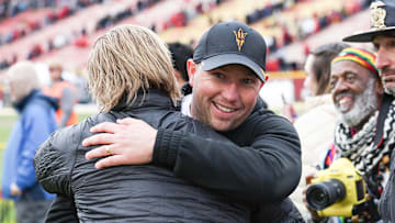 Ames, Iowa, USA; Arizona State Sun Devils head coach Kenny Dillingham is all smiles after the Sun Devils defeated the Iowa State Cyclones at Jack Trice Stadium. 