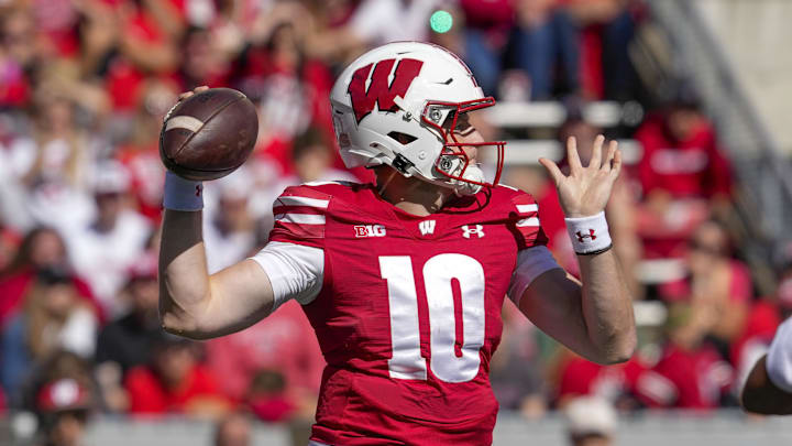 Sep 7, 2024; Madison, Wisconsin, USA;  Wisconsin Badgers quarterback Tyler Van Dyke (10) throws a pass during the second quarter against the South Dakota Coyotes at Camp Randall Stadium. Mandatory Credit: Jeff Hanisch-Imagn Images