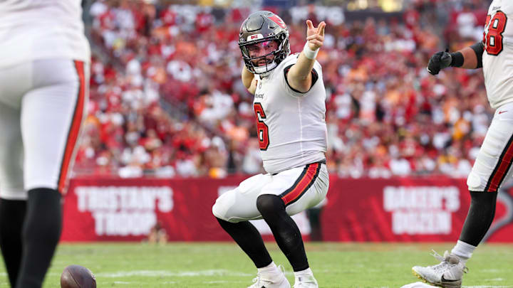 Sep 8, 2024; Tampa, Florida, USA; Tampa Bay Buccaneers quarterback Baker Mayfield (6) reacts after a first down against the Washington Commanders in the fourth quarter at Raymond James Stadium. Mandatory Credit: Nathan Ray Seebeck-Imagn Images