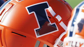 Oct 1, 2022; Madison, Wisconsin, USA;  Illinois Fighting Illini logo on a helmet during warmups prior to the game against the Wisconsin Badgers at Camp Randall Stadium. Mandatory Credit: Jeff Hanisch-Imagn Images