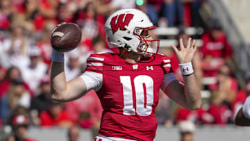 Sep 7, 2024; Madison, Wisconsin, USA;  Wisconsin Badgers quarterback Tyler Van Dyke (10) throws a pass during the second quarter against the South Dakota Coyotes at Camp Randall Stadium. Mandatory Credit: Jeff Hanisch-Imagn Images