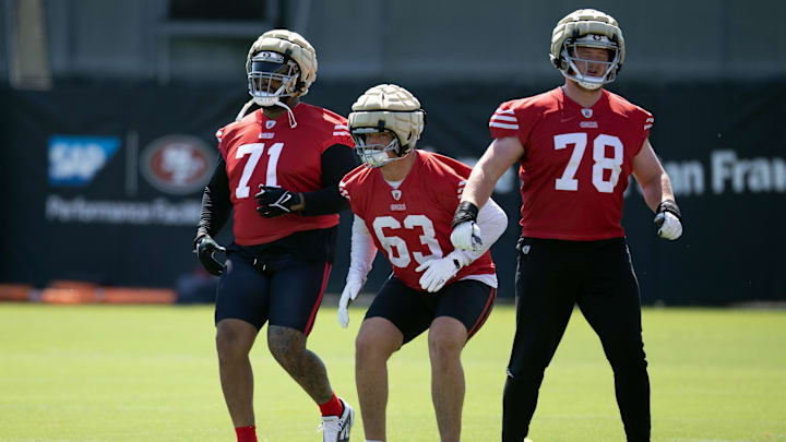 Jun 10, 2025; Santa Clara, CA, USA; San Francisco 49ers offensive linemen Trent Williams (71), Nick Zakelj (63) and Ben Bartch (78) participate in a drill during an OTA at Levi's Stadium. Mandatory Credit: D. Ross Cameron-Imagn Images Jun 10, 2025; Santa Clara, CA, USA; San Francisco 49ers offensive linemen Trent Williams (71), Nick Zakelj (63) and Ben Bartch (78) participate in a drill during an OTA at Levi's Stadium. Mandatory Credit: D. Ross Cameron-Imagn Images