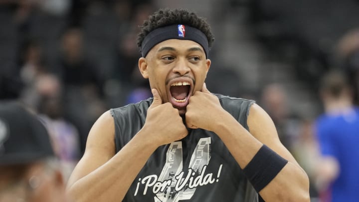 Mar 29, 2024; San Antonio, Texas, USA; San Antonio Spurs forward Keldon Johnson (3) looses up before a game against the New York Knicks at Frost Bank Center.