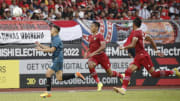 Abdul Azizi Ali Rahman of Brunei (L) and Rizky Ridho...