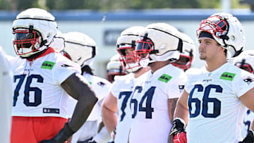Jul 23, 2025; Foxborough, MA, USA; New England Patriots offensive tackle Will Campbell (66) look on before the start of drills  at training camp at Gillette Stadium. Mandatory Credit: Eric Canha-Imagn Images