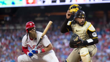 Jun 18, 2024; Philadelphia, Pennsylvania, USA; San Diego Padres catcher Luis Campusano (12) attempts to field a pass ball in front of Philadelphia Phillies outfielder Brandon Marsh (16) at Citizens Bank Park. Mandatory Credit: Bill Streicher-USA TODAY Sports