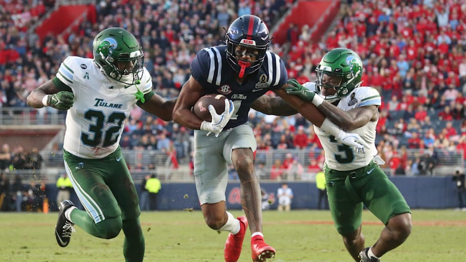 Rebels wide receiver De’Zhaun Stribling runs after the catch for a touchdown.