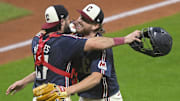Sep 12, 2025; Cleveland, Ohio, USA; Cleveland Guardians catcher Austin Hedges (27) and starting pitcher Tanner Bibee (28) celebrate a win over the Chicago White Sox at Progressive Field. Mandatory Credit: David Richard-Imagn Images