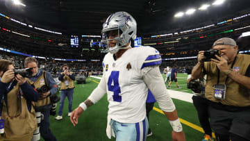 Jan 14, 2024; Arlington, Texas, USA; Dallas Cowboys quarterback Dak Prescott (4) walks off the field after a playoff loss to Green Bay. 