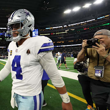 Jan 14, 2024; Arlington, Texas, USA; Dallas Cowboys quarterback Dak Prescott (4) walks off the field against the Green Bay Packers after the 2024 NFC wild card game at AT&T Stadium. Mandatory Credit: Kevin Jairaj-Imagn Images