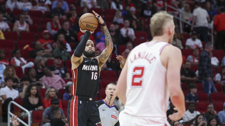 Apr 5, 2024; Houston, Texas, USA; Miami Heat forward Caleb Martin (16) shoots the ball during the fourth quarter against the Houston Rockets at Toyota Center. Mandatory Credit: Troy Taormina-USA TODAY Sports