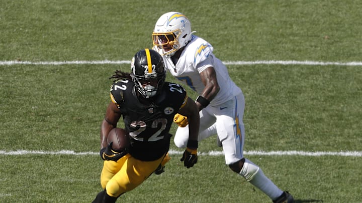 Sep 22, 2024; Pittsburgh, Pennsylvania, USA; Pittsburgh Steelers running back Najee Harris (22) carries the ball past Los Angeles Chargers cornerback Kristian Fulton (7) during the fourth quarter at Acrisure Stadium. Pittsburgh won 20-10. Mandatory Credit: Charles LeClaire-Imagn Images Sep 22, 2024; Pittsburgh, Pennsylvania, USA; Pittsburgh Steelers running back Najee Harris (22) carries the ball past Los Angeles Chargers cornerback Kristian Fulton (7) during the fourth quarter at Acrisure Stadium. Pittsburgh won 20-10. Mandatory Credit: Charles LeClaire-Imagn Images