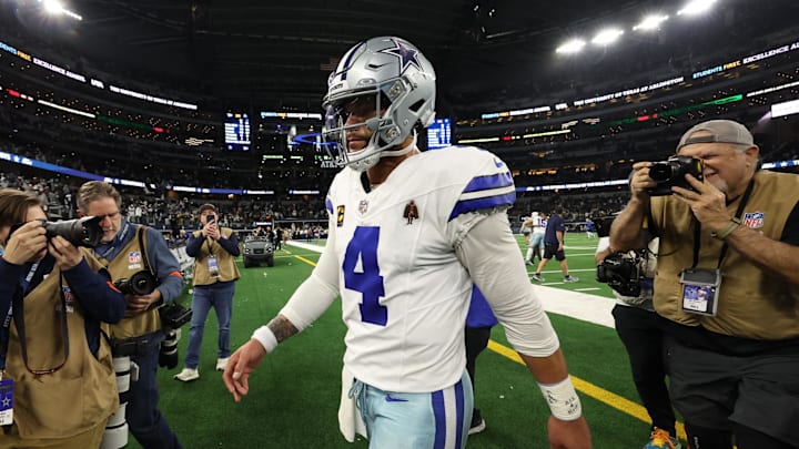 Jan 14, 2024; Arlington, Texas, USA; Dallas Cowboys quarterback Dak Prescott (4) walks off the field against the Green Bay Packers after the 2024 NFC wild card game at AT&T Stadium. Mandatory Credit: Kevin Jairaj-Imagn Images