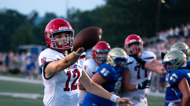 Brentwood Academy's George MacIntyre (12) crosses the goal line for a touchdown against Brentwood at James C. Parker Stadium Friday night, Aug. 25, 2023.