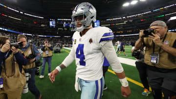 Jan 14, 2024; Arlington, Texas, USA; Dallas Cowboys quarterback Dak Prescott (4) walks off the field against the Green Bay Packers after the 2024 NFC wild card game at AT&T Stadium. Mandatory Credit: Kevin Jairaj-USA TODAY Sports