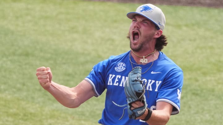 Kentucky's Simon Gregersen (40) yells out in victory after striking out Tennessee's Blake Grimmer (14) to win the NCAA college baseball game in Knoxville, Tenn., on April 20, 2025.