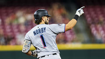 Cincinnati, Ohio, USA; Miami Marlins third baseman Connor Norby (1) reacts after hitting a solo home run in the ninth inning against the Cincinnati Reds at Great American Ball Park.