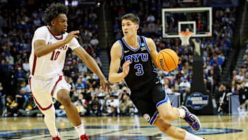 Mar 27, 2025; Newark, NJ, USA; Brigham Young Cougars guard Egor Demin (3) drives to the basket against Alabama Crimson Tide forward Mouhamed Dioubate (10) during the first half during an East Regional semifinal of the 2025 NCAA tournament at Prudential Center. Mandatory Credit: Vincent Carchietta-Imagn Images
