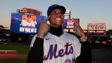 Dec 12, 2024; Flushing, NY, USA; New York Mets right fielder Juan Soto poses for photos during his introductory press conference at Citi Field. 