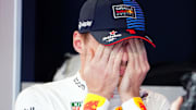 May 4, 2024; Miami Gardens, Florida, USA; Red Bull Racing driver Max Verstappen (1) reacts as he waits in the paddock before the F1 Sprint Race at Miami International Autodrome. Mandatory Credit: John David Mercer-Imagn Images