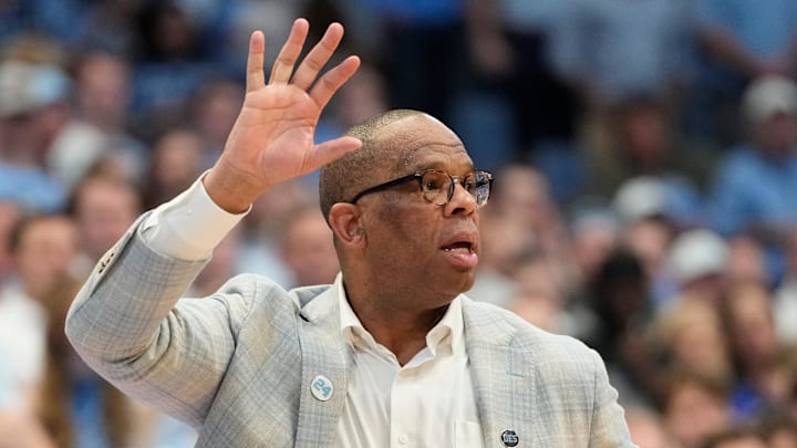 Mar 8, 2025; Chapel Hill, North Carolina, USA;  North Carolina Tar Heels head coach Hubert Davis reacts in the second half at Dean E. Smith Center. Mandatory Credit: Bob Donnan-Imagn Images
