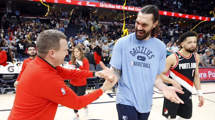 Apr 4, 2023; Memphis, Tennessee, USA; Memphis Grizzlies center Steven Adams (right) talks with a Portland Trail Blazers assistant coach after the game at FedExForum. Mandatory Credit: Petre Thomas-Imagn Images