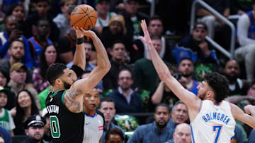 Boston Celtics forward Jayson Tatum shoots against Oklahoma City Thunder forward Chet Holmgren.