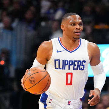 Nov 14, 2023; Denver, Colorado, USA; LA Clippers guard Russell Westbrook (0) drives to the basket during the first quarter against the Denver Nuggets at Ball Arena. Mandatory Credit: Ron Chenoy-USA TODAY Sports