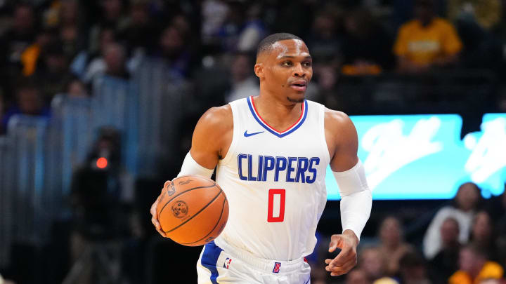 Nov 14, 2023; Denver, Colorado, USA; LA Clippers guard Russell Westbrook (0) drives to the basket during the first quarter against the Denver Nuggets at Ball Arena. Mandatory Credit: Ron Chenoy-USA TODAY Sports