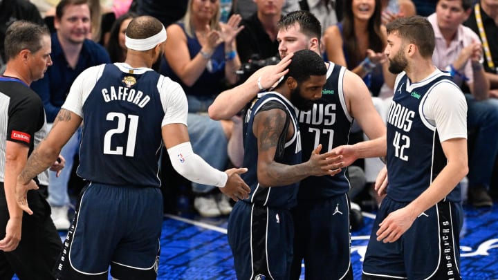 Mavericks stars Kyrie Irving and Luka Doncic embrace after the final buzzer of the first half in Game 4 of the NBA Finals. Mavericks stars Kyrie Irving and Luka Doncic embrace after the final buzzer of the first half in Game 4 of the NBA Finals.