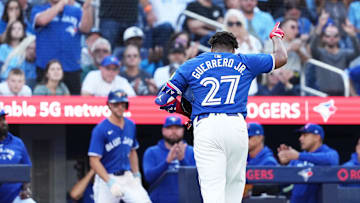 Sep 29, 2024; Toronto, Ontario, CAN; Toronto Blue Jays designated hitter Vladimir Guerrero Jr. (27) acknowledges the crowd as he walks towards the dugout against the Miami Marlins during the eighth inning at Rogers Centre. Mandatory Credit: Nick Turchiaro-Imagn Images
