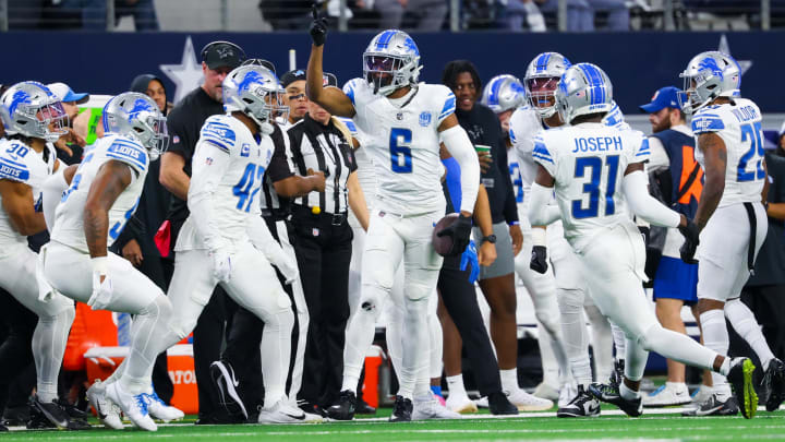 Dec 30, 2023; Arlington, Texas, USA;  Detroit Lions safety Ifeatu Melifonwu (6) celebrates with teammates after making an interception during the first quarter against the Dallas Cowboys at AT&T Stadium. Mandatory Credit: Kevin Jairaj-USA TODAY Sports