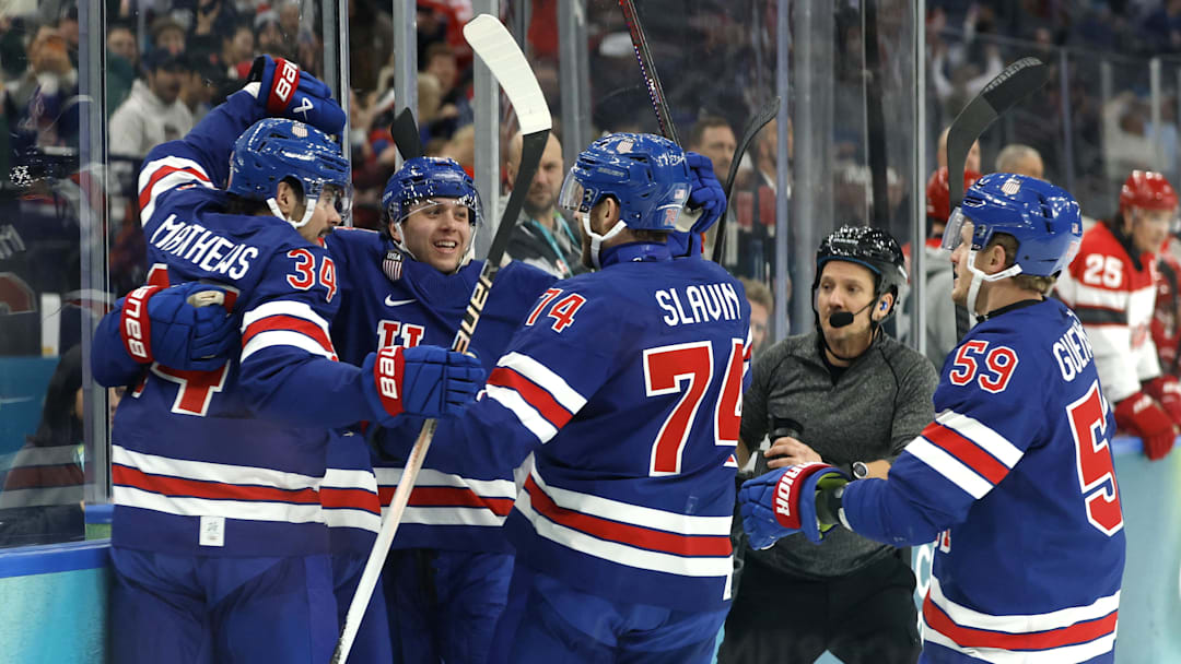 Feb 14, 2026; Milan, Italy; Matt Boldy of United States celebrates scoring their first goal with teammates against Denmark in men's ice hockey group C play during the Milano Cortina 2026 Olympic Winter Games at Milano Santagiulia Ice Hockey Arena. Mandatory Credit: Geoff Burke-Imagn Images