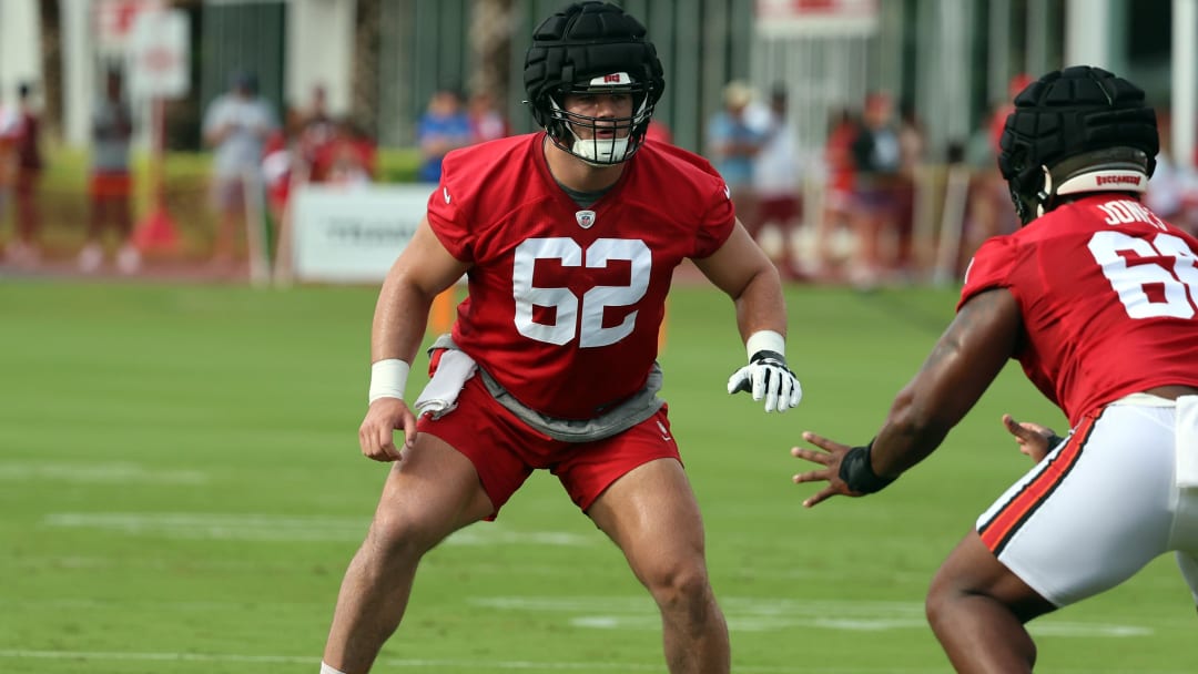 Jul 25, 2024; Tampa, FL, USA;  Tampa Bay Buccaneers center Graham Barton (62) works out during training camp at AdventHealth Training Center. Mandatory Credit: Kim Klement Neitzel-USA TODAY Sports