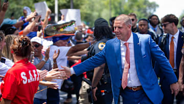 Florida Gators head coach Billy Napier shakes hands during Gator Walk for the season opener at Ben Hill Griffin Stadium in Gainesville, FL on Saturday, August 31, 2024 against the University of Miami Hurricanes. [Doug Engle/Gainesville Sun]