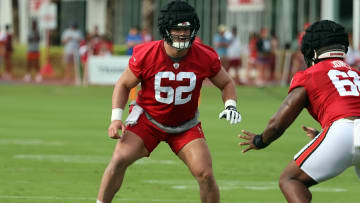 Jul 25, 2024; Tampa, FL, USA;  Tampa Bay Buccaneers center Graham Barton (62) works out during training camp at AdventHealth Training Center. Mandatory Credit: Kim Klement Neitzel-USA TODAY Sports