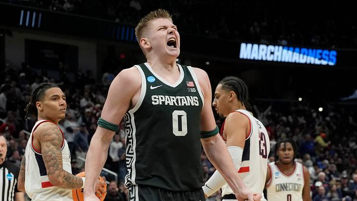 Michigan State forward Jaxon Kohler (0) reacts after getting fouled by Connecticut guard Solo Ball (1) during the second half of the 2026 NCAA Men's Basketball East Regional game against UConn at Capital One Arena in Washington DC on Friday, March 27, 2026. 
Michigan State lost the game 67-63.