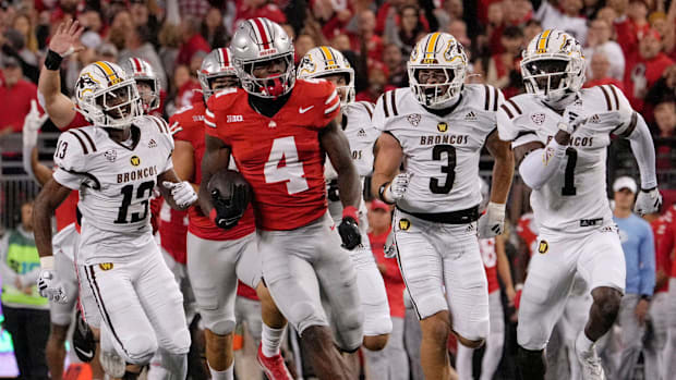 Sept. 7, 2024; Columbus, Ohio, USA;Ohio State Buckeyes wide receiver Jeremiah Smith (4) runs for a touchdown during the firs