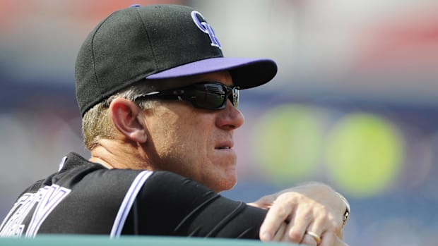 Colorado Rockies manager Jim Tracy in the dugout watching a game