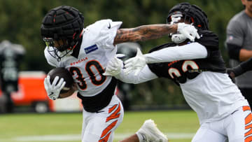 Bengals Chase Brown runs the ball during their training camp on Tuesday August 13, 2024.