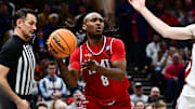 Mar 21, 2025; Cleveland, OH, USA; Robert Morris Colonials guard Kam Woods (8) plays the ball in the second half against the Alabama Crimson Tide during the NCAA Tournament First Round at Rocket Arena. Mandatory Credit: Ken Blaze-Imagn Images