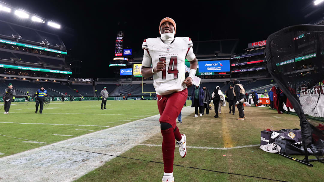 Jan 4, 2026; Philadelphia, Pennsylvania, USA; Washington Commanders quarterback Josh Johnson (14) runs off the field after a victory against the Philadelphia Eagles at Lincoln Financial Field. Mandatory Credit: Bill Streicher-Imagn Images Jan 4, 2026; Philadelphia, Pennsylvania, USA; Washington Commanders quarterback Josh Johnson (14) runs off the field after a victory against the Philadelphia Eagles at Lincoln Financial Field. Mandatory Credit: Bill Streicher-Imagn Images