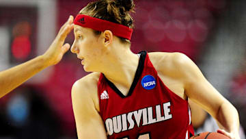 Mar 19, 2012; College Park, MD, USA; Louisville Cardinals guard Becky Burke (11) controls the ball during the second half of the game against the Maryland Terrapins in the second round of the 2012 NCAA women's basketball tournament at Comcast Center.  Mandatory Credit: Evan Habeeb-Imagn Images