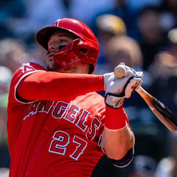 Angels right fielder Mike Trout (27) takes a swing during an at-bat against the Seattle Mariners at T-Mobile Park. 