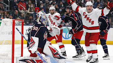 Jan 1, 2022; Columbus, Ohio, USA; Carolina Hurricanes right wing Nino Niederreiter (21) celebrates a goal by left wing Steven Lorentz (78) (not pictured) during the third period against the Columbus Blue Jackets at Nationwide Arena. Mandatory Credit: Russell LaBounty-Imagn Images