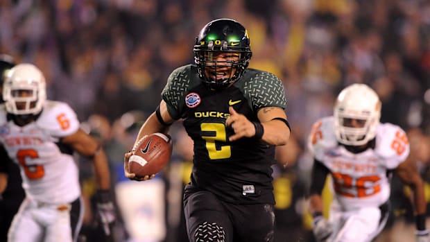 Dec 30, 2008; San Diego, CA, USA; Oregon Ducks quarterback Jeremiah Masoli (2) scores on a 41-yard touchdown run in the third