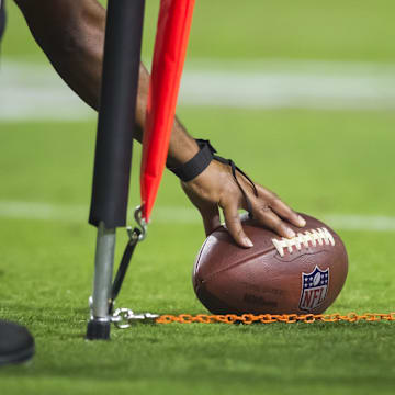 Oct 28, 2021; Glendale, Arizona, USA; Detailed view as NFL referee measures the football for a first down with yard markers during the Arizona Cardinals game against the Green Bay Packers.