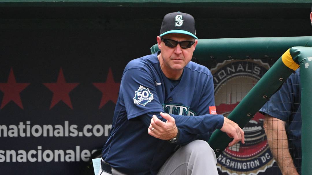Jun 14, 2026; Washington, District of Columbia, USA; Seattle Mariners manager Dan Wilson (6) watches from the dugout against the Washington Nationals during the fifth inning at Nationals Park. Mandatory Credit: Rafael Suanes-Imagn Images Jun 14, 2026; Washington, District of Columbia, USA; Seattle Mariners manager Dan Wilson (6) watches from the dugout against the Washington Nationals during the fifth inning at Nationals Park. Mandatory Credit: Rafael Suanes-Imagn Images